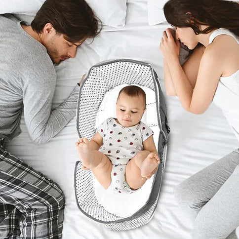 lit de voyage bébé position