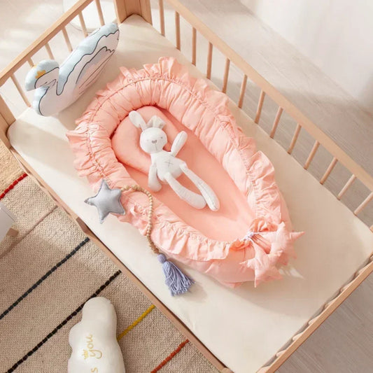 lit de voyage bébé rose