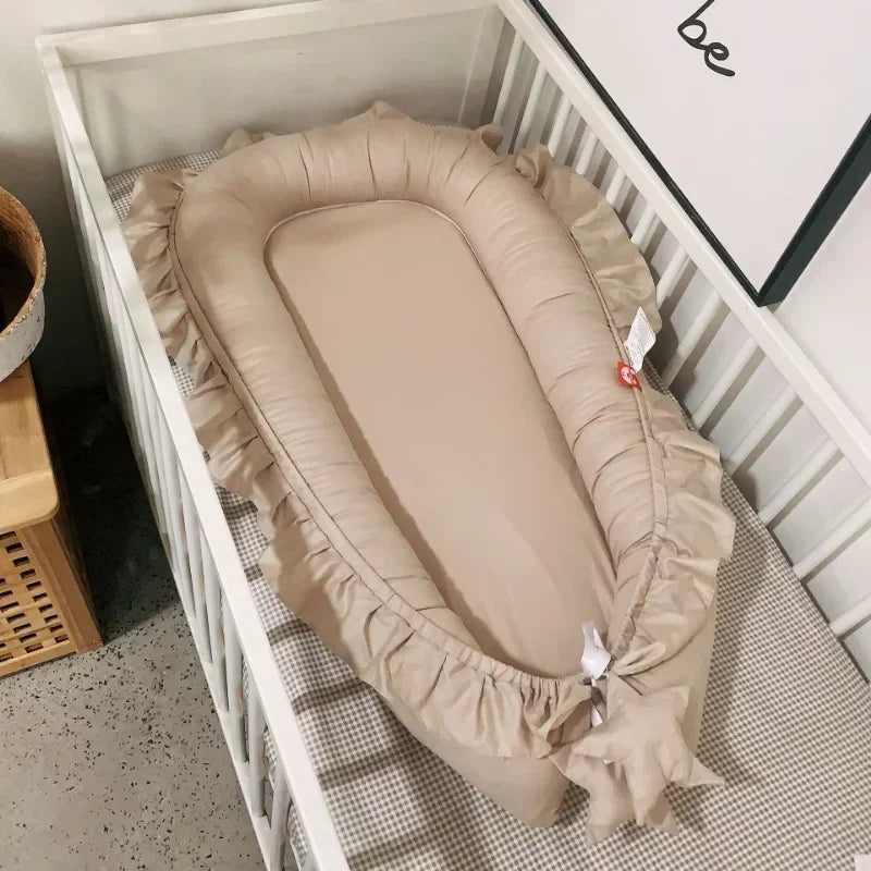 lit de voyage bébé beige