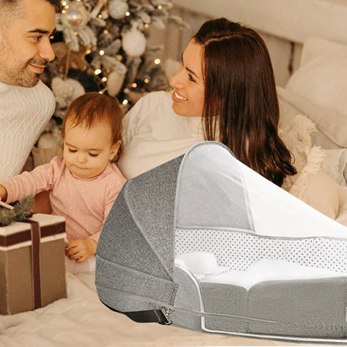 lit de voyage bébé grisatre